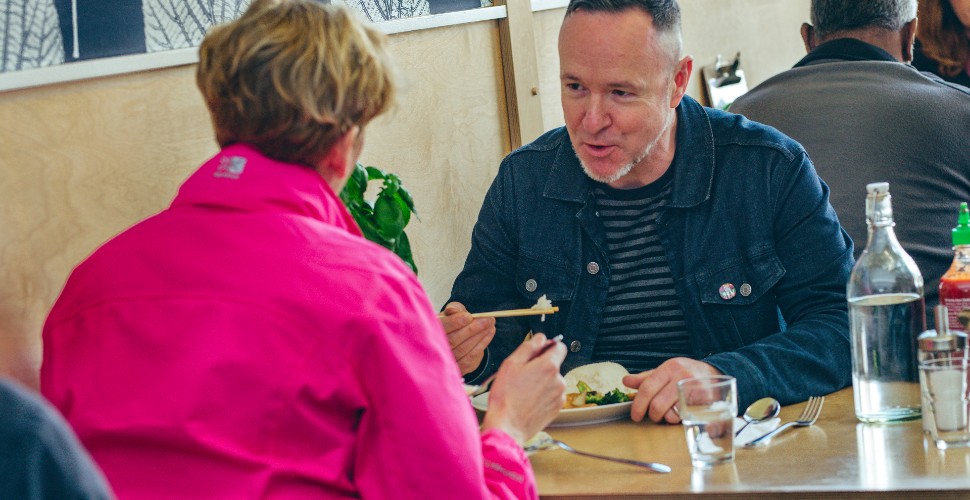 Couple eating at AtKitchen in Plymouth Market 